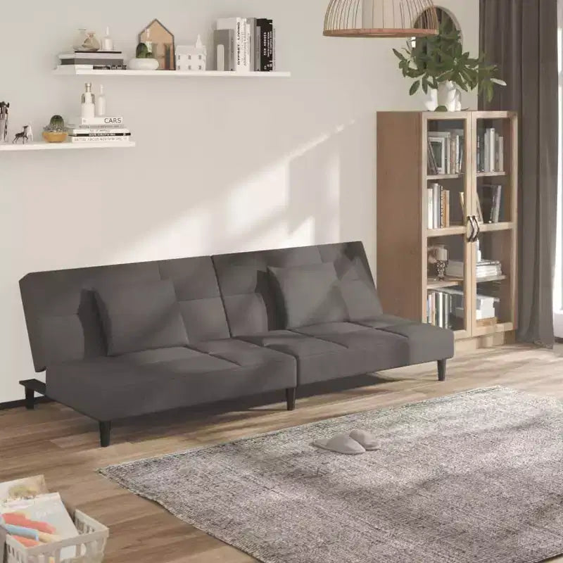 Divano letto a 2 posti con due cuscini