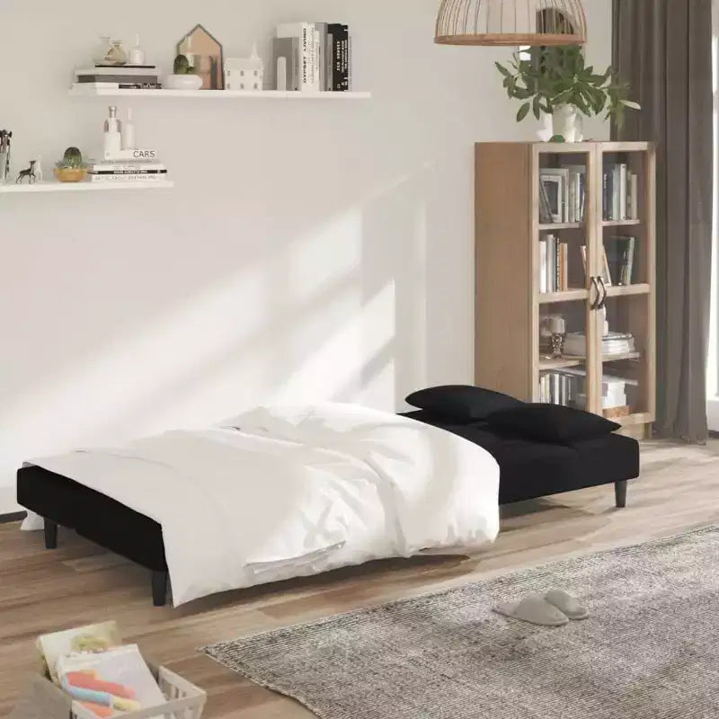 Divano letto a 2 posti con due cuscini