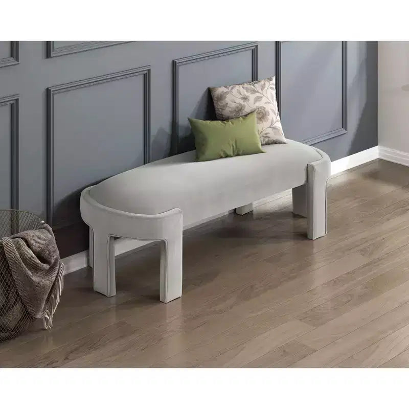Panca moderna ed elegante imbottita in velluto con struttura in compensato, lussuoso pouf ovale confortevole per camera da letto, ingresso