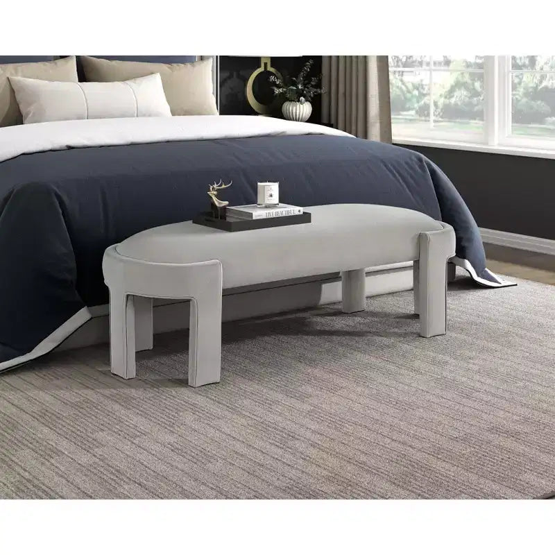 Panca moderna ed elegante imbottita in velluto con struttura in compensato, lussuoso pouf ovale confortevole per camera da letto, ingresso