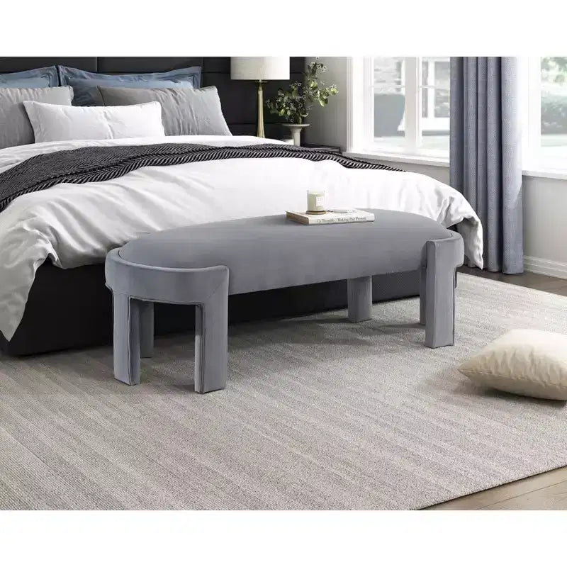 Panca moderna ed elegante imbottita in velluto con struttura in compensato, lussuoso pouf ovale confortevole per camera da letto, ingresso