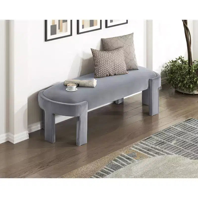 Panca moderna ed elegante imbottita in velluto con struttura in compensato, lussuoso pouf ovale confortevole per camera da letto, ingresso